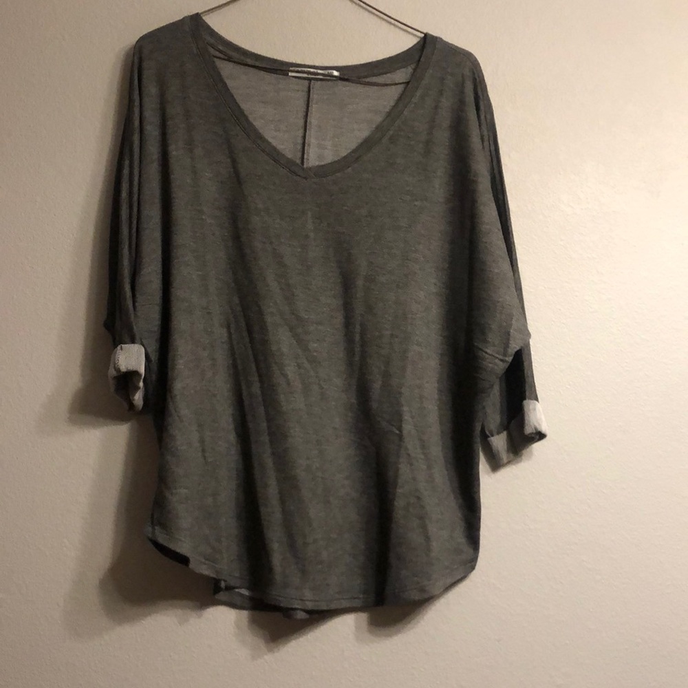 Grey 3/4 length sleeve.  Size M